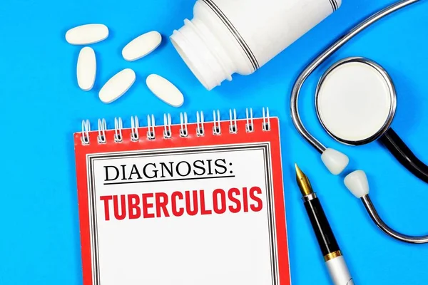 Tuberculosis is a chronic bacterial infection. Text inscription on the form in the medical folder. The diagnosis was made by a doctor. Prevention and treatment with medications.