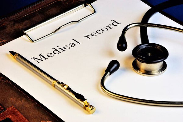 Medical records and stethoscope. Medicine  the science that studies the disease, preventing and leading them to a successful outcome.  