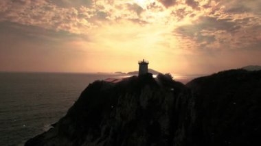 deniz feneri günbatımı okyanus doğru