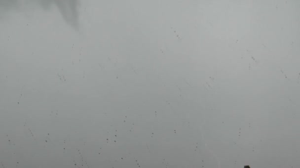 Multiple Lightning Strikes Grey Sky Raindrops Window — Stock Video