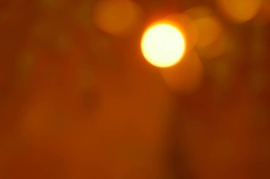 Bulanık ışıklandırma yanığı. Turuncu renk arkaplanı. Soyut duvar kağıdı. Boşluğu kopyala