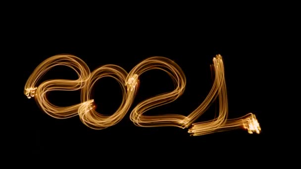 2021年至2020年新年 创意符号 黑色背景 手写数字 — 图库视频影像