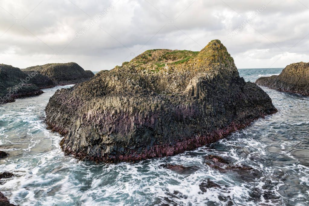 This is an interestingly colored sea rock in Ballintoy on the Antrim coast in Nothern Ireland