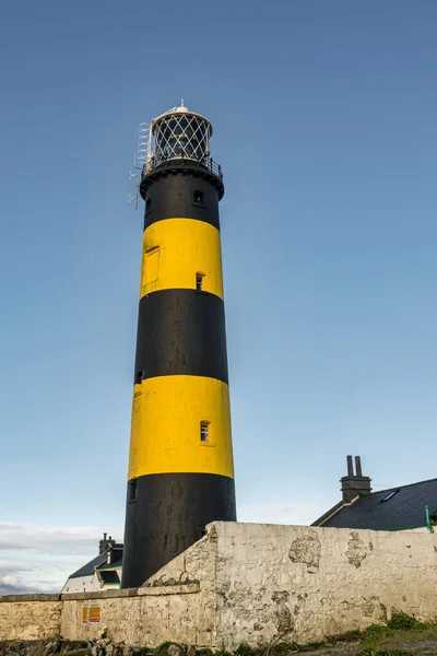 This is a picture of St John\'s Point Lighthouse  on the east coast of Northern Ireland on the Irish Sea.  It is one of Irelands many iconic coastal lighhouses