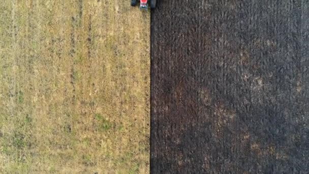 Aerial Footage Looking Straight Tractor Plowing Field Ireland Summer — Stock video