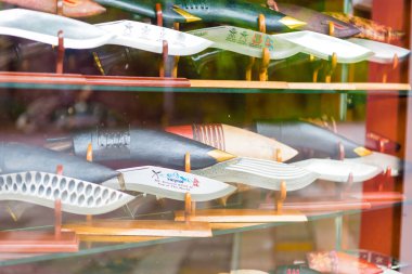 Pokhara, Nepal - July 31, 2018 : Kukri or khukuri knives as souvenirs in shop window in Pokhara town, are considered as the national knife and icon of Nepal clipart