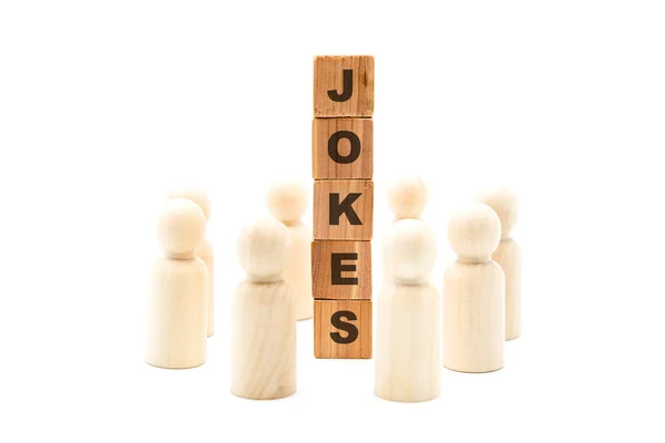 単語のジョーク ホワイト バック グラウンド ミニマリストの概念に分離の周りに円のビジネス チームとして木彫の人物像 — ストック写真