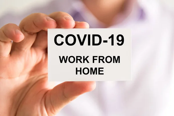 Closeup Businessman Holding Card Text Covid Work Home Business Concept — Stock Photo, Image