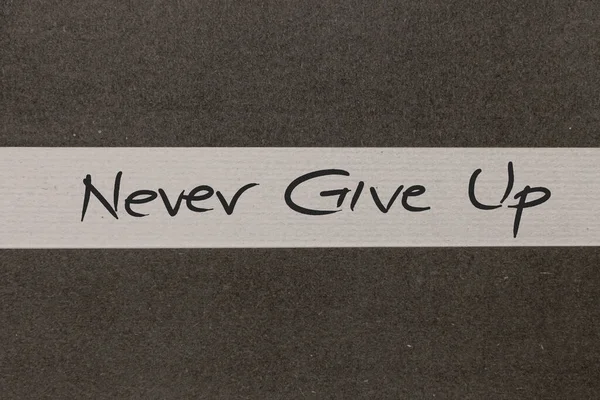 Bianco Grigio Sfondo Carta Colorata Con Never Give Motivazionale Messaggio — Foto Stock
