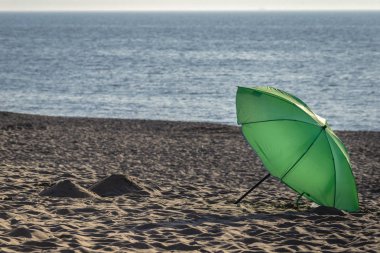Katwijk, Hollanda'da sahilde gün batımı