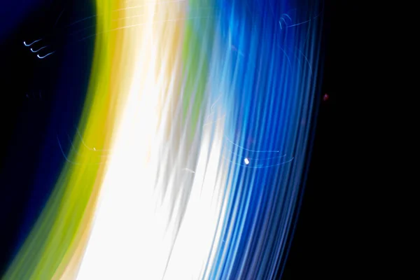 abstract colored lines drawn by light on a black background photography freezelight