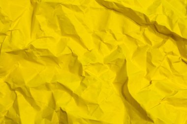 sarı buruşuk kağıdın arka plan olarak doku. soyut şekiller ve dokular