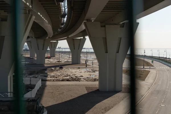 modern pedestrian bridge across the Bay in St. Petersburg. concrete bridge supports .Russia