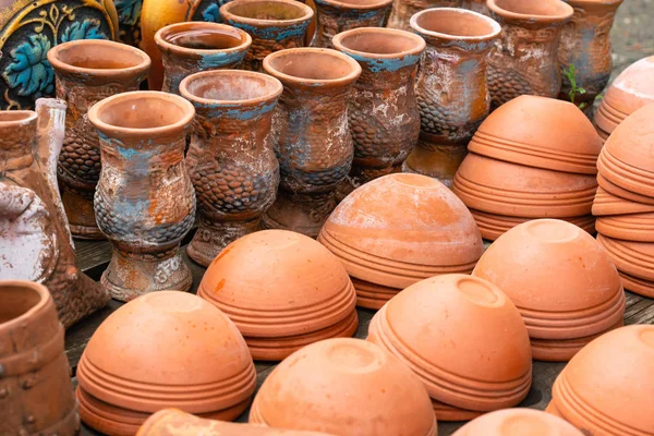 many utensils are made of clay. pottery and handmade close-up
