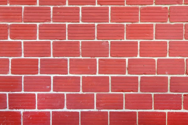 Czerwony mur z cegły jako tekstury/tło — Zdjęcie stockowe