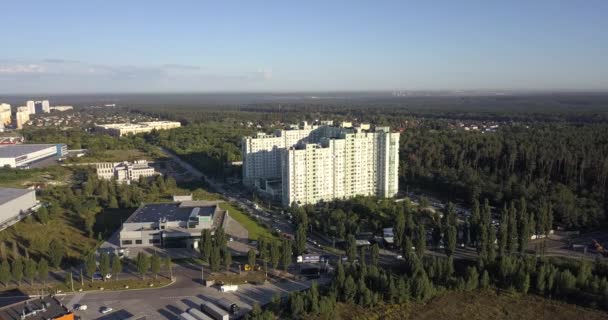 Drone shot of lonely high-rise building in forest 4k 4096 x 2160 pixels — Stock Video