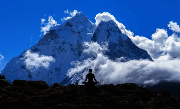 Serenity and yoga practicing at himalayas mountain range, meditation