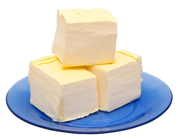 Mantequilla en un plato azul —  Fotos de Stock