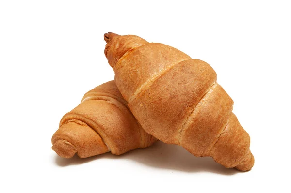 Two croissants on a white background. — Stock Photo, Image