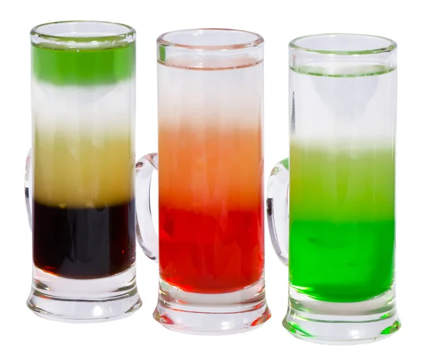 Three alcoholic cocktail shot in a glass on a white background — Stock Photo, Image