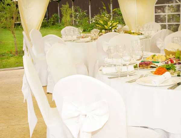 Banquet table for a holiday with festive dishes — Stock Photo, Image