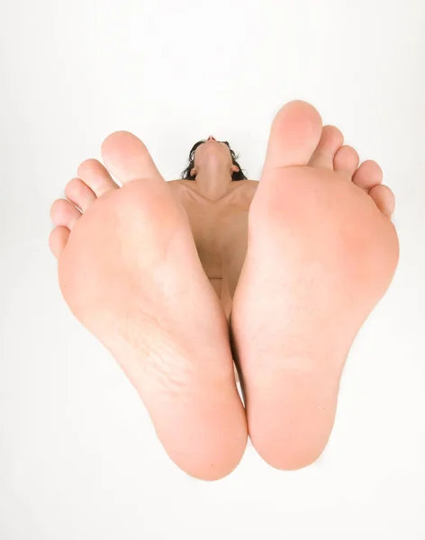 Bottom view of female feet on white background — Stock Photo, Image