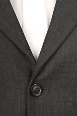 Takım elbisenin düğmesi. Takım elbise kumaşı