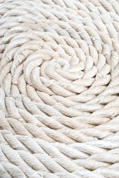 Фон из крученых белых веревок — стоковое фото