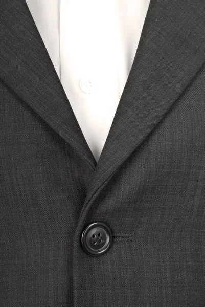 Takım elbisenin düğmesi. Takım elbise kumaşı
