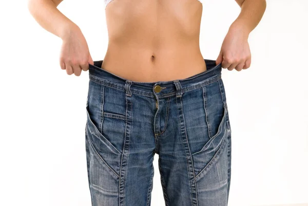 Woman in very large pants. Diet and weight loss — Stock Photo, Image