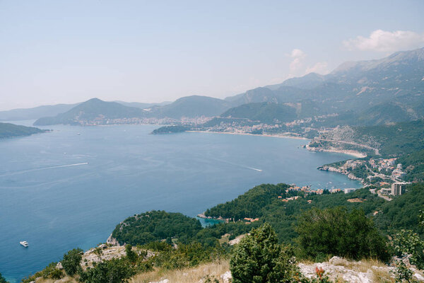 The road along the coast on the Adriatic coast in Montenegro, through the cities - Przno, Kamenovo, Rafailovici, Becici, Budva.