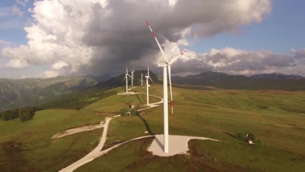 Niksic, Montenegro - 01 october 2019: Lots of wind turbines on the hill, against the backdrop of an epic sky. Royalty Free Stock Video