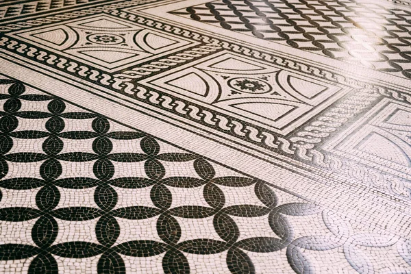 Black and white mosaic on the floor at the Budapest Opera.