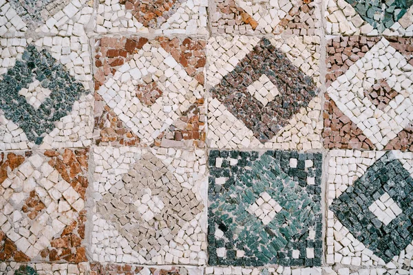 Ceramic mosaic in the form of squares with rhombuses of different colors. — Stock Photo, Image