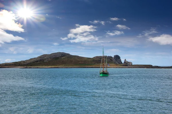 Large boat sailing on the Howth Peninsula near the fishing village of Howth.