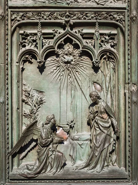Ornate detail of the bronze door of Milan Catehdral in Italy — Stock Photo, Image