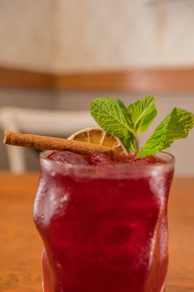 drink red with cinnamonan mint and lemon