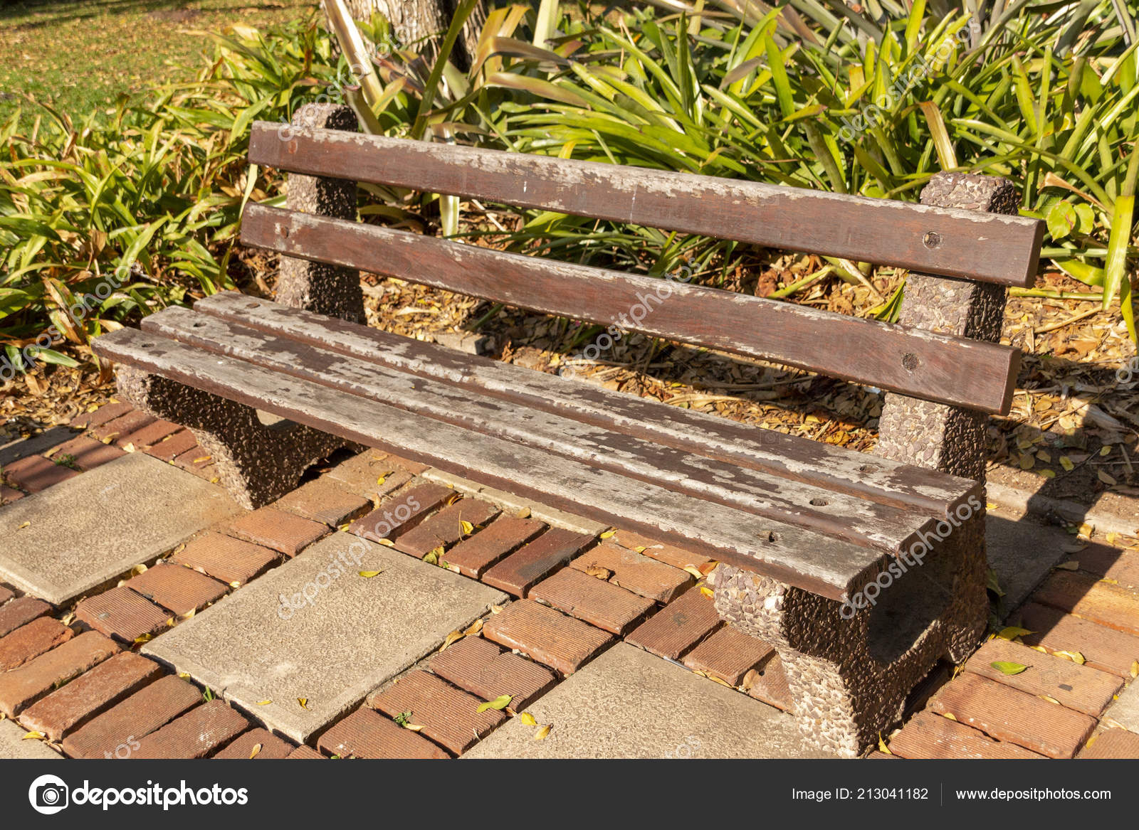 Warn Old Double Seated Outdoor Chair Wooden Slates Concrete Sides