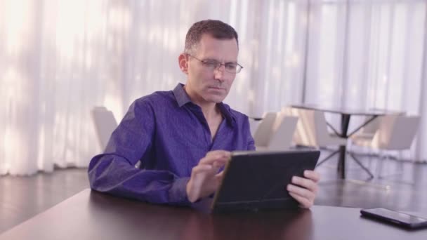 Close Businessman Working Tablet While Sitting Lobby — Stock Video