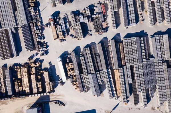 Aerial view of industrial building material,stacked on a constru — Stock Photo, Image