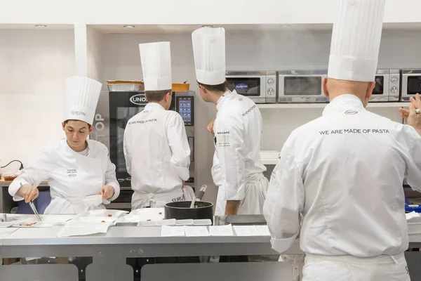 Cooks working at Tuttofood 2019 in Milan, Italy — Stock Photo, Image