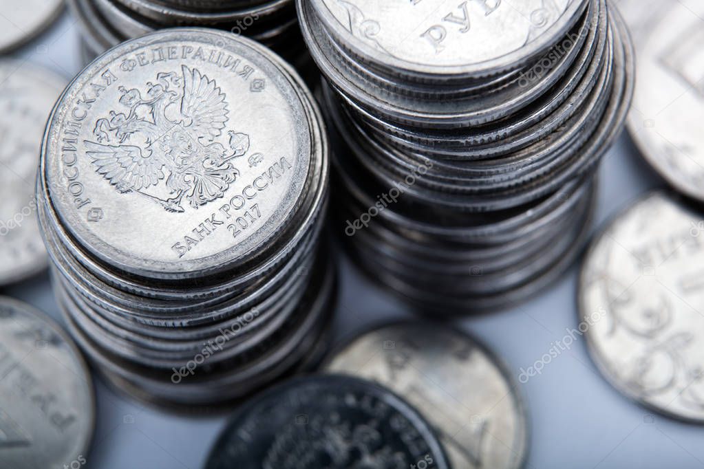 piles of Russian ruble coins close up macro