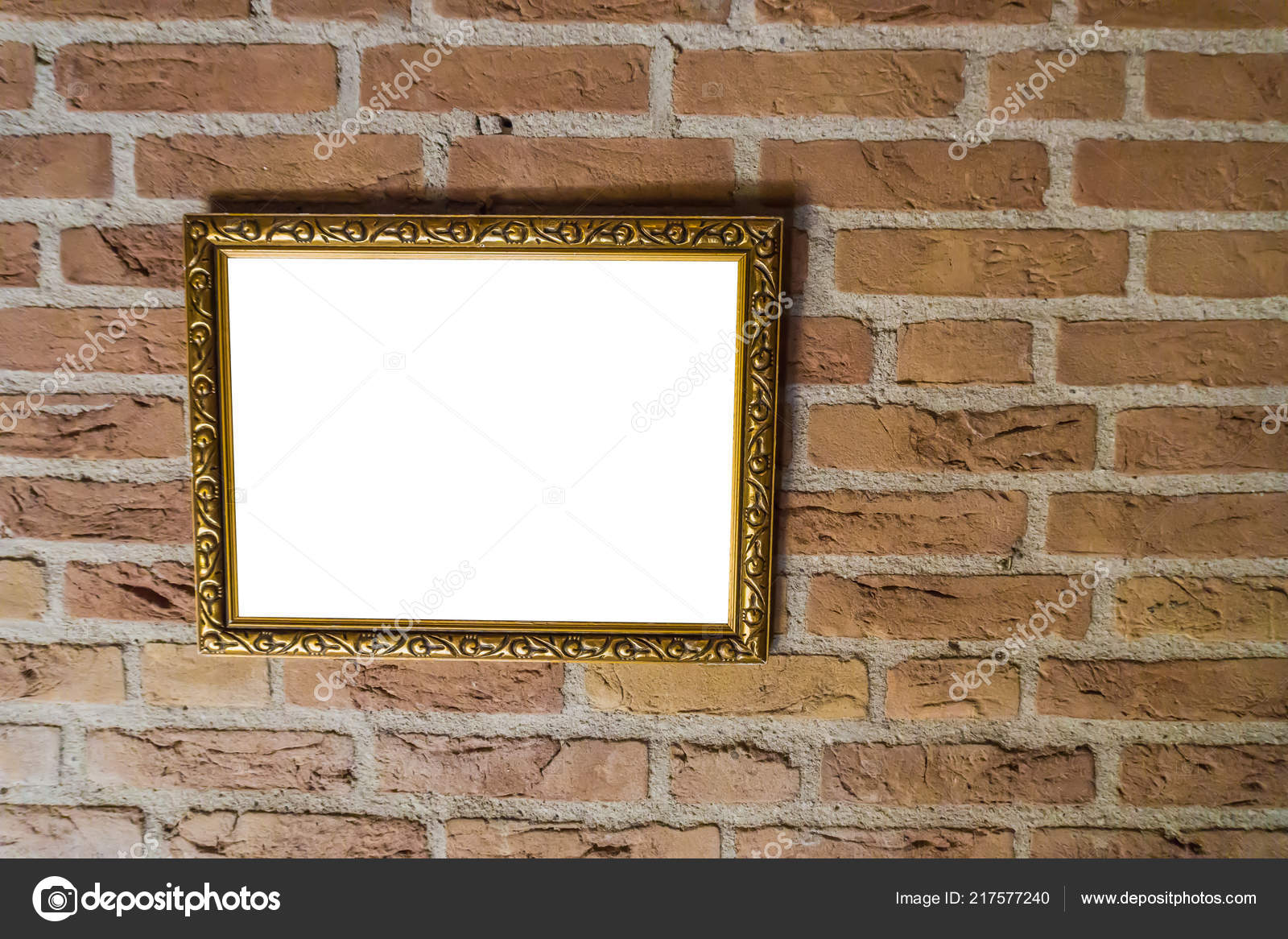 Empty Golden Vintage Painting Frame Hanging Brick Wall