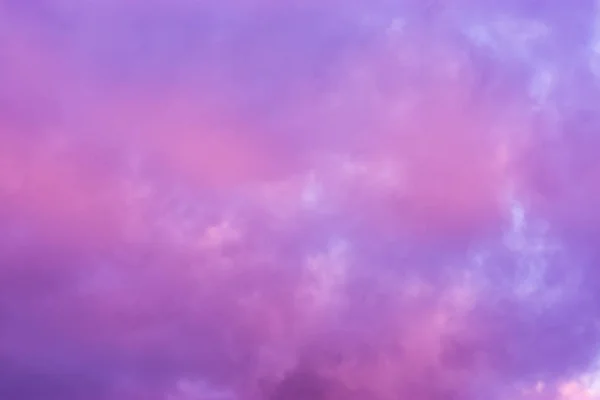 pink and purple nacreous clouds, a color effect in the sky that rarely occurs in winter