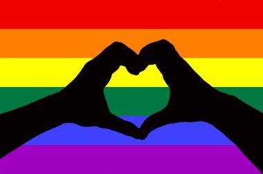 LGBT kavramı, iki el birlikte bir gökkuşağı bayrağı arka plan üzerinde izole kalp şekil verme