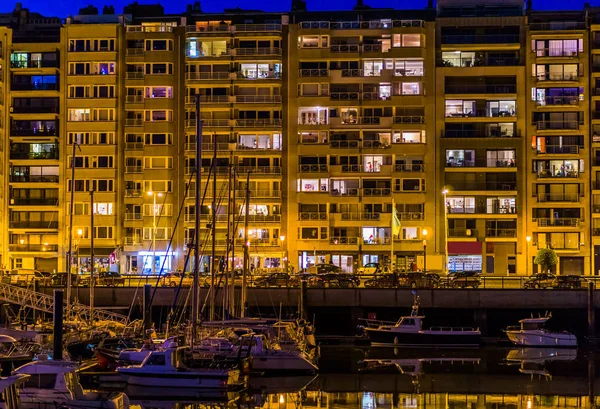 View on the city street and apartment buildings from the harbor, Blankenberge, Belgium, city architecture of a popular Belgian town — Stock Photo, Image