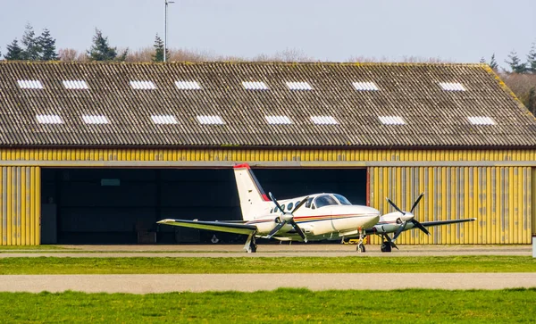 Parked white aircraft at the airport, air transportation, recreational sport and hobby — Stock Photo, Image