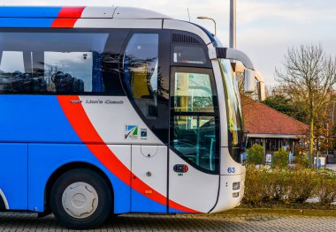 the front of a lion's coach tour bus, model euro 6 from man, alphen aan den rijn, 12 february, 2019, the Netherlands clipart