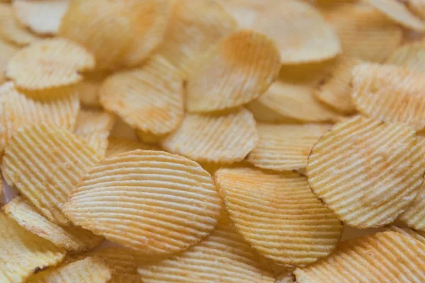 Krispiga chips mellanmål konsistens bakgrund — Stockfoto