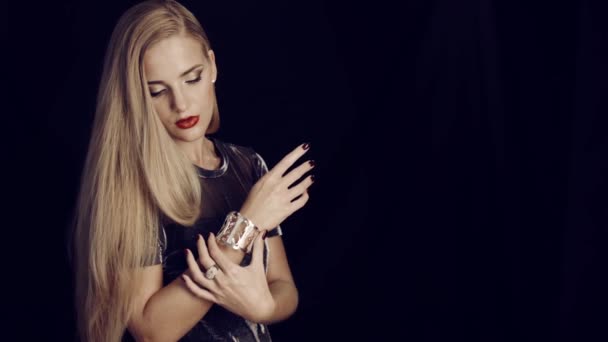 Beautiful Girl Smart Evening Dress Puts Her Hands Gold Bracelet — Stock Video